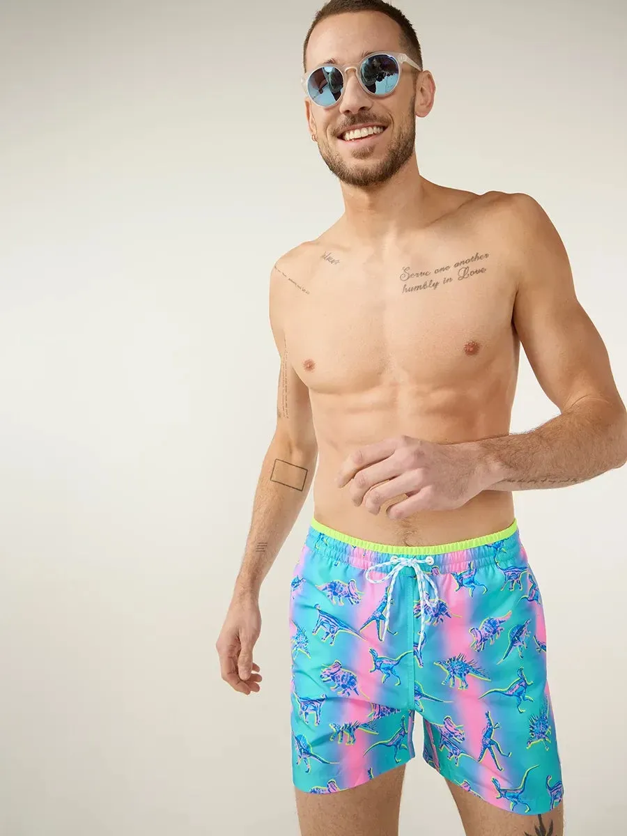 The Dino Delights 5.5" (Magic Print Classic Swim Trunk)